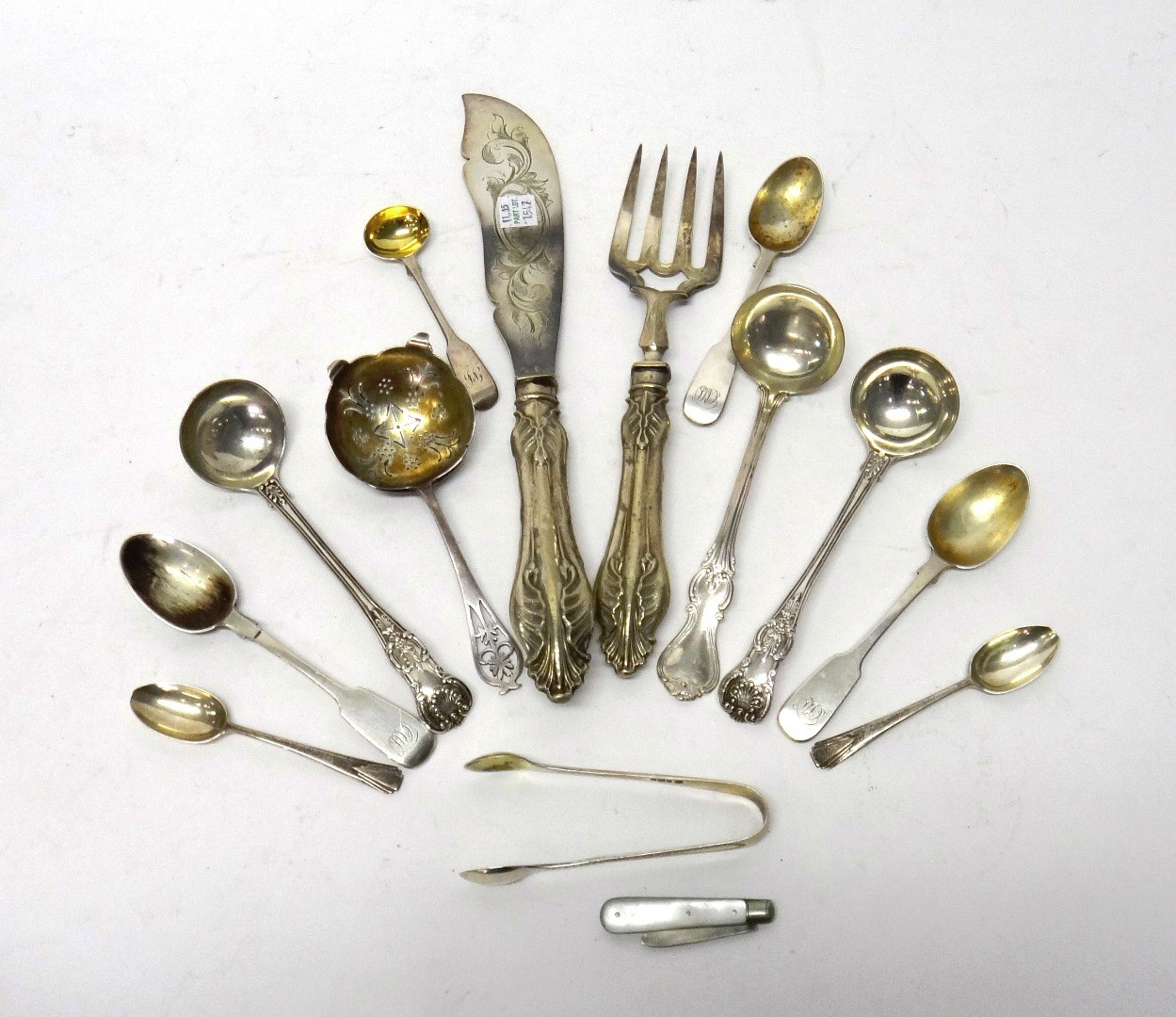 Appraisal: Silver comprising a pair of King's pattern small sauce ladles