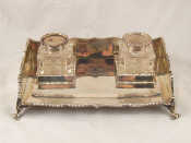 Appraisal: A fine silver inkstand on scroll feet the cut glass