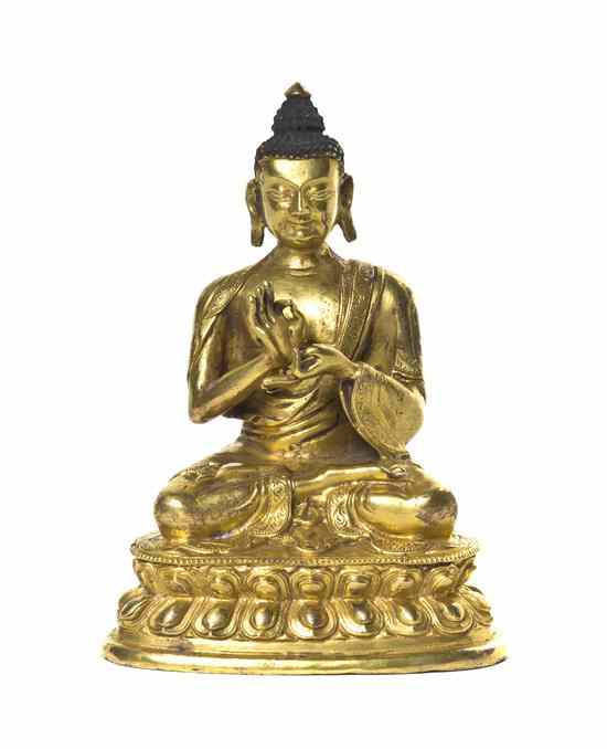 Appraisal: A Gilt Bronze Model of a Buddha depicted seated with