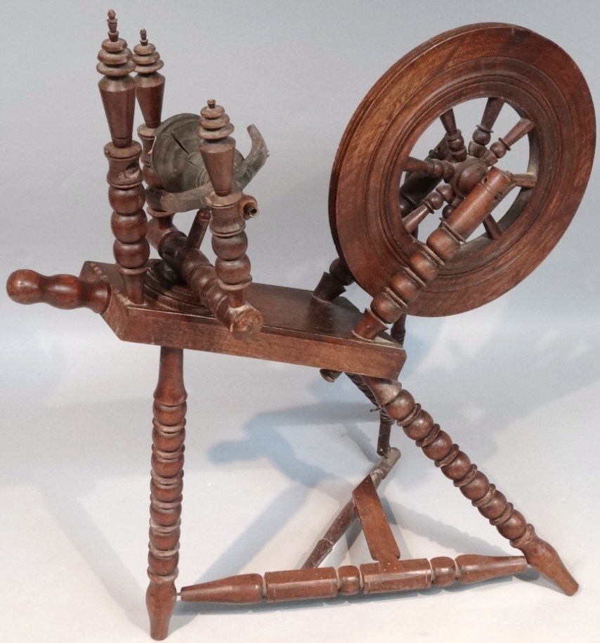 Appraisal: An early thC oak and elm spinning wheel with articulated