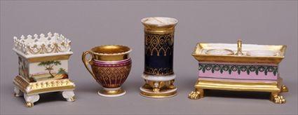 Appraisal: TWO PARIS PORCELAIN GILT AND POLYCHROME ENCRIERS One decorated with