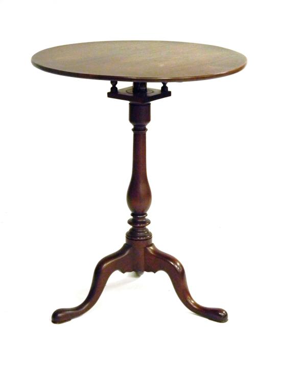 Appraisal: Chippendale style mahogany candle stand round top over vase stand