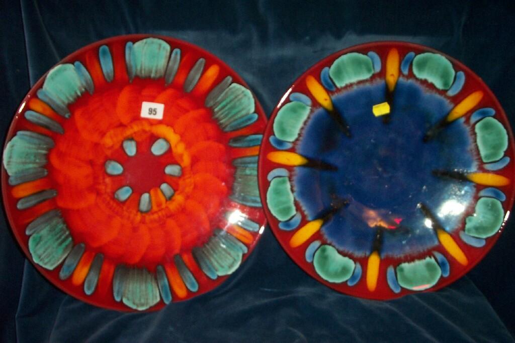 Appraisal: Two Poole pottery chargers of circular form one with orange