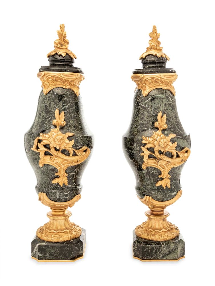 Appraisal: A Pair of Continental Gilt Bronze Mounted Marble Urns A