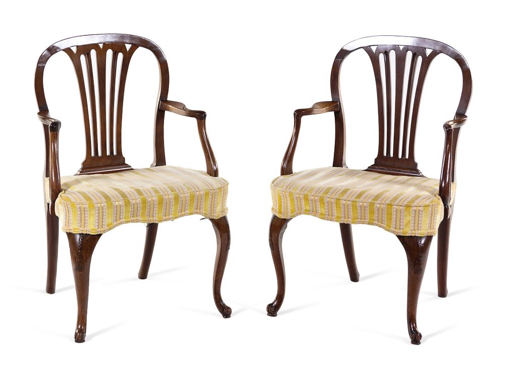 Appraisal: A Pair of George Ill Tassel-Carved Mahogany Scroll-Foot Armchairs A