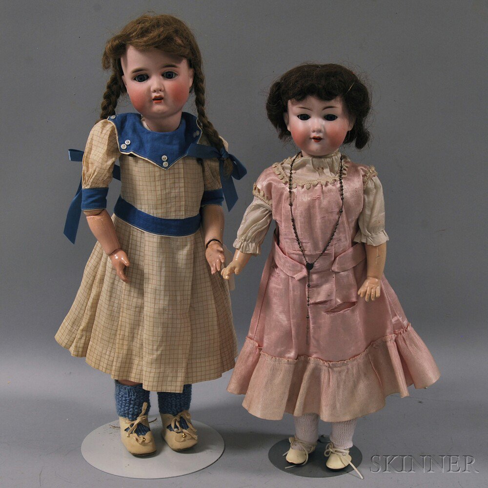 Appraisal: Two German Bisque Head Dolls both with open mouths blue