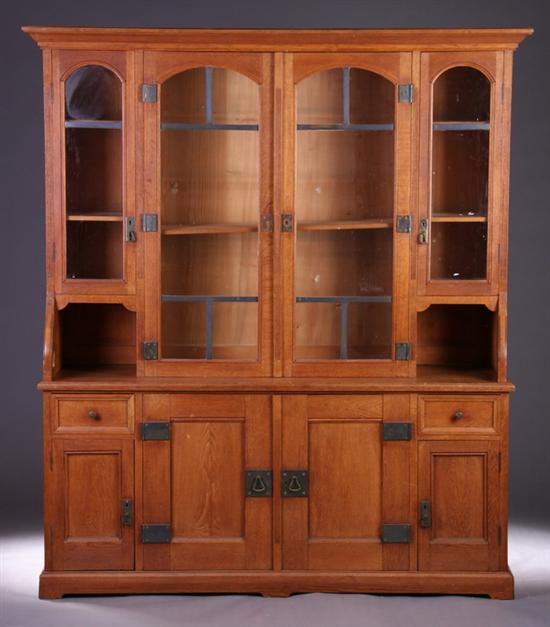 Appraisal: SWISS JUGENDSTIL MISSION-TYPE BOOKCASE Early th century Cove-molded crown above