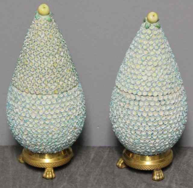 Appraisal: Pair of Porcelain Covered Urns on Gilt BronzeBases Dresden or