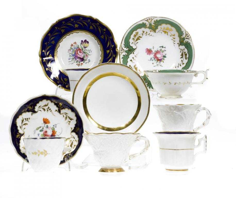 Appraisal: TWO ROCKINGHAM TRIOS A TEACUP AND SAUCER AND A COFFEE