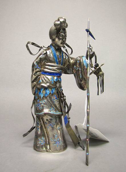 Appraisal: An enameled and pieced silver female figure Her layered garments