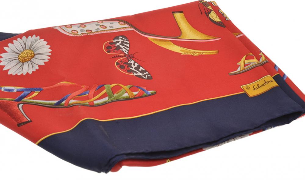 Appraisal: A SILK SCARF BY SALVATORE FERRAGAMO Styled with shoes butterflies