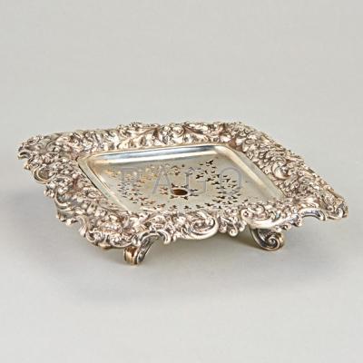 Appraisal: DURGIN STERLING REPOUSSE BUTTER DISH Square with floral and scroll