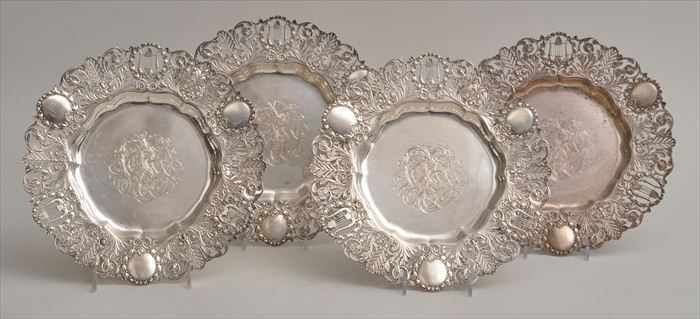 Appraisal: SET OF FOUR DOMINICK HAFF MONOGRAMMED SILVER SERVICE PLATES Retailed