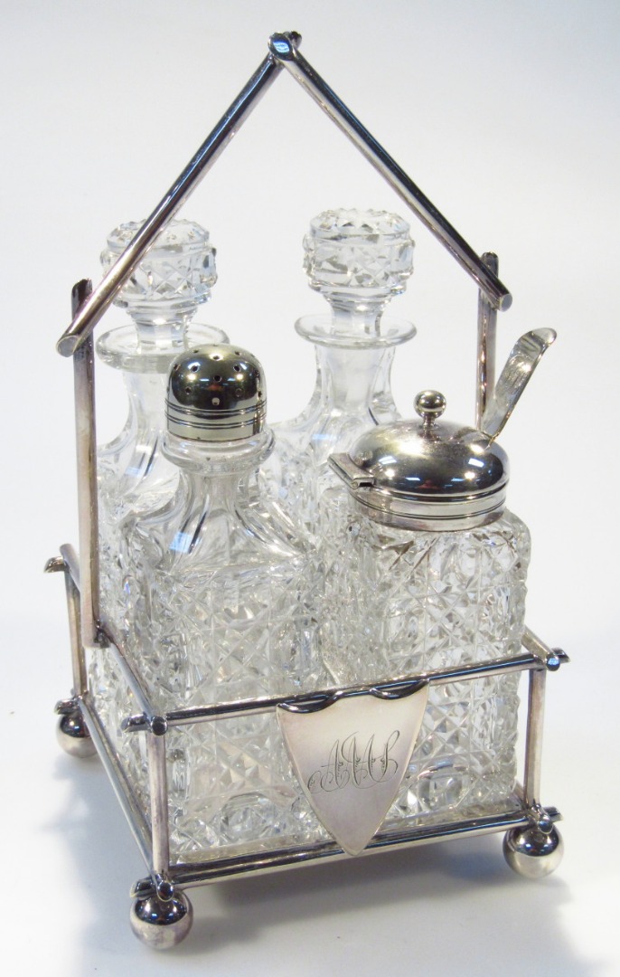 Appraisal: An early thC silver plated and cut glass four piece