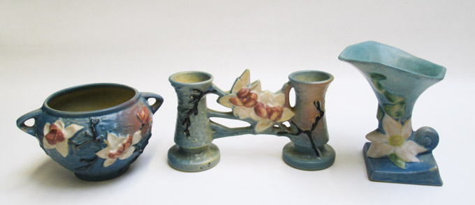 Appraisal: THREE ROSEVILLE ART POTTERY PIECES two in the Magnolia pattern