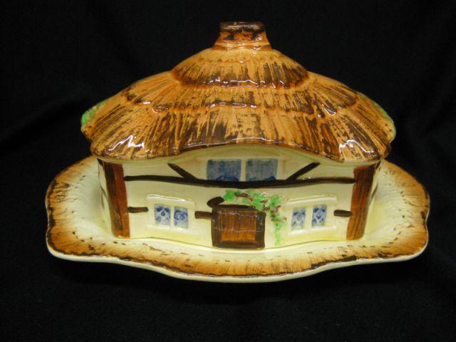 Appraisal: English Figural Pottery Covered Butter Dish cottage Burlington ware by