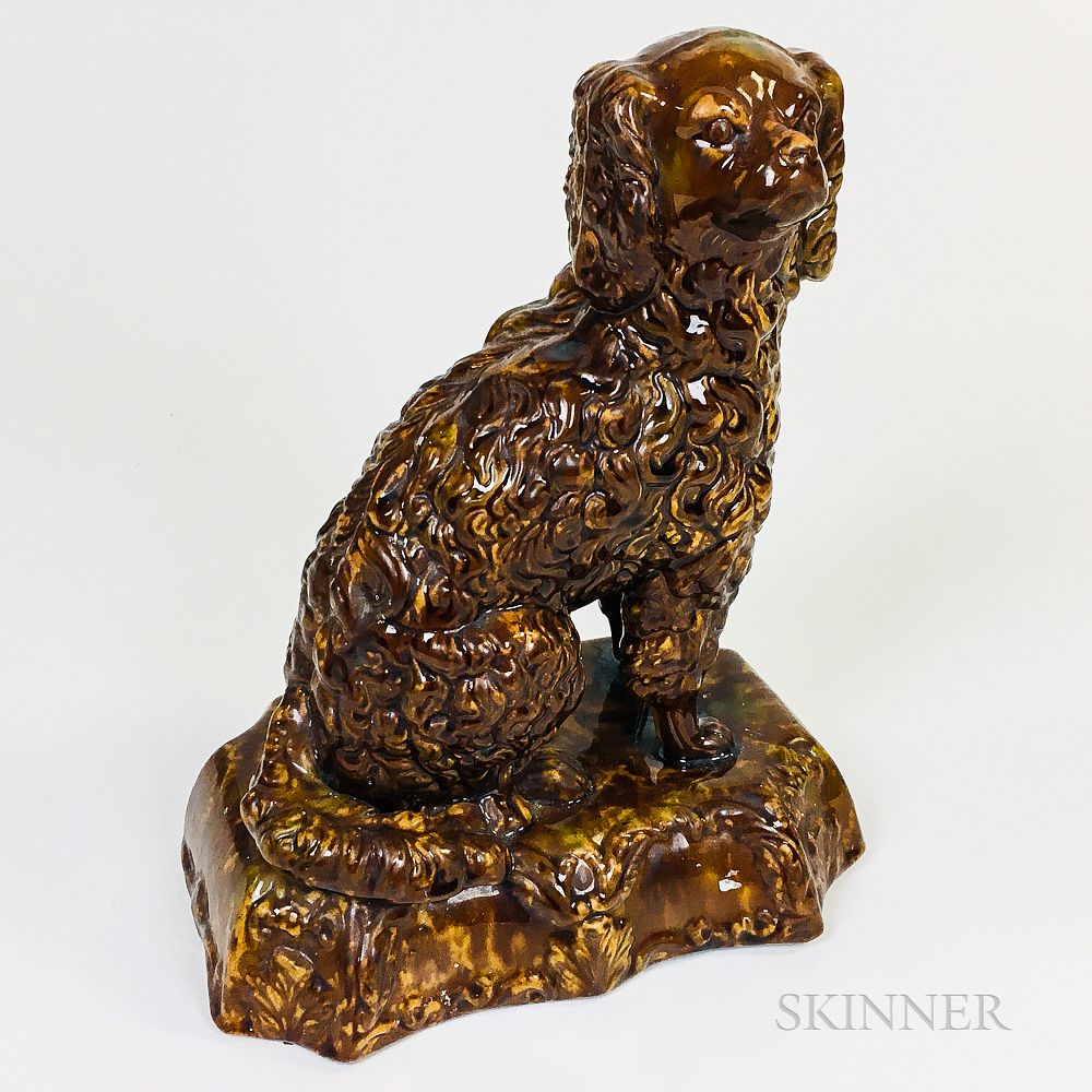 Appraisal: Rockingham-glazed Ceramic Spaniel Rockingham-glazed Ceramic Spaniel th century ht in