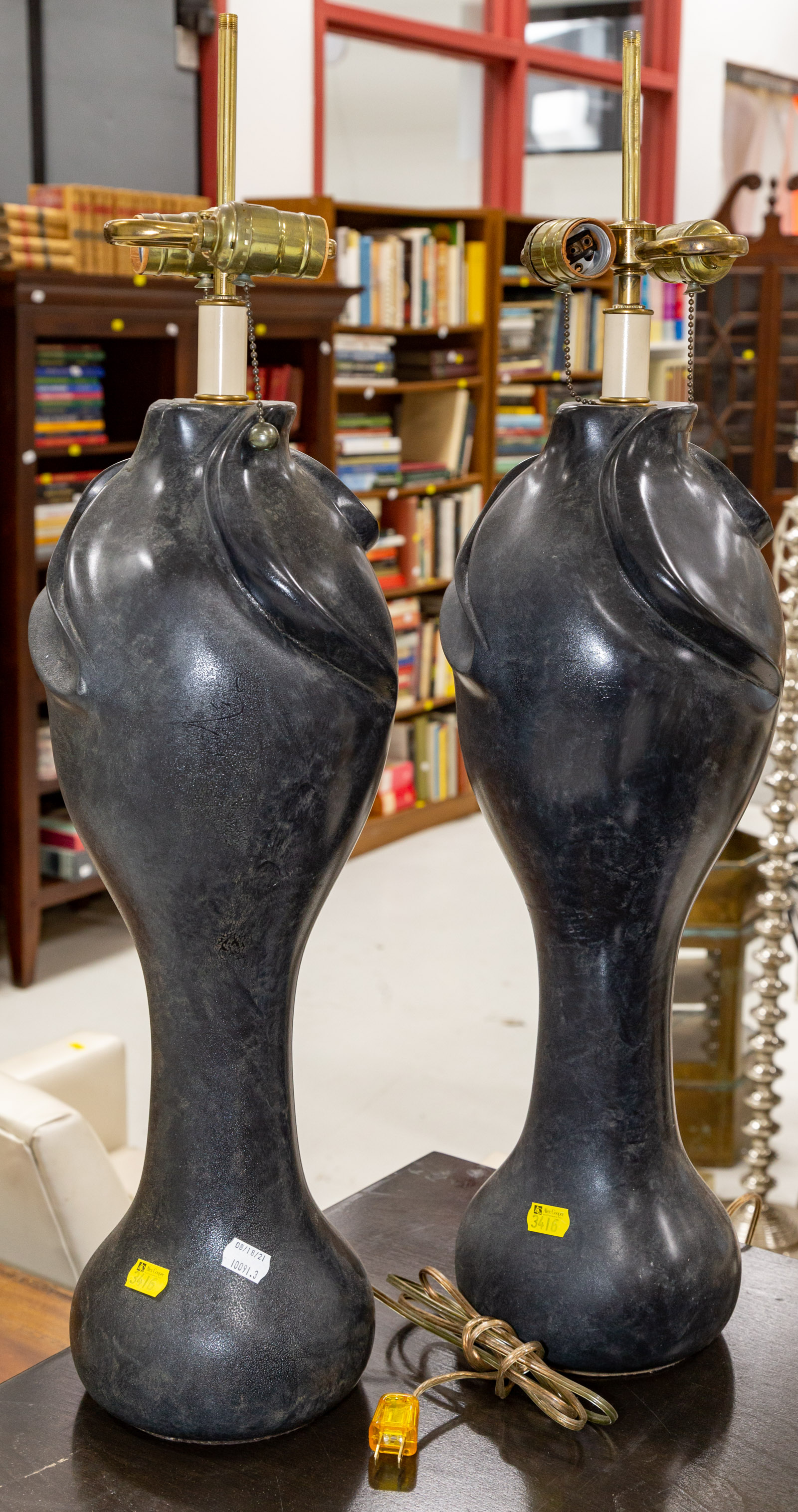 Appraisal: A PAIR OF LARGE TABLE LAMPS Contemporary with abstract cast