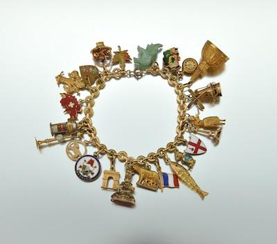 Appraisal: A French Gold Bracelet With Charms Including Buccellati k two