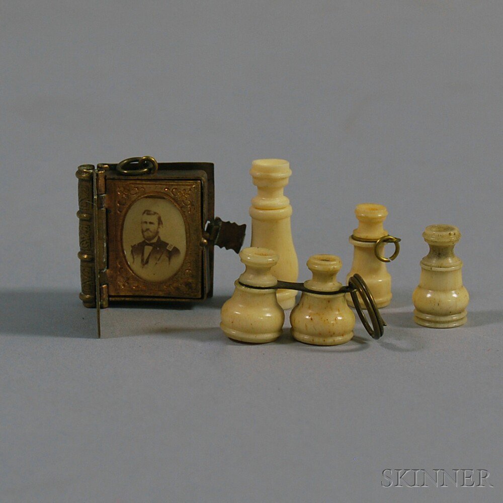 Appraisal: Four Stanhopes or Peep-eye Viewers and a Miniature Brass Album