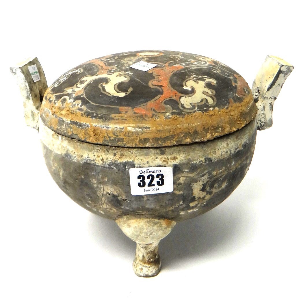 Appraisal: A Chinese grey pottery tripod vessel and cover Ding Han