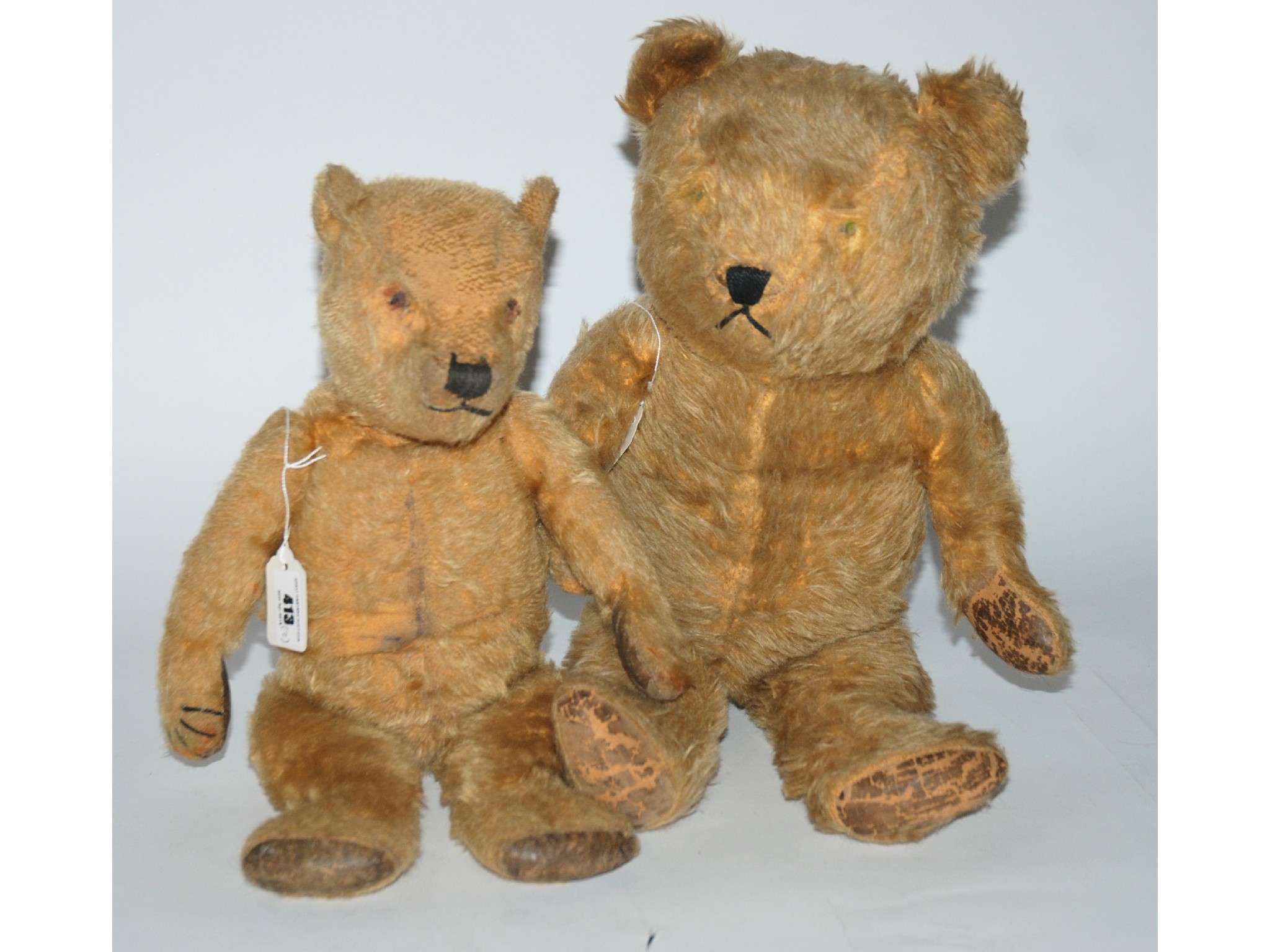 Appraisal: Two early plush teddy bears both lacking eyes