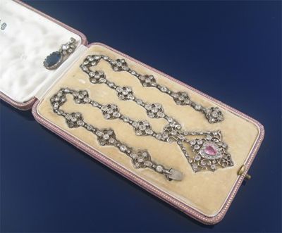 Appraisal: A pink and white stone pendant necklace fitted case by