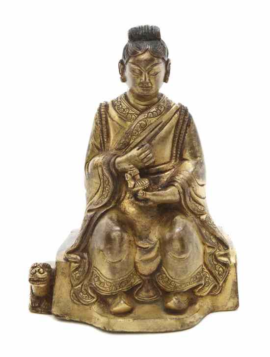 Appraisal: A Chinese Gilt Bronze Figure of a Woman depicted in