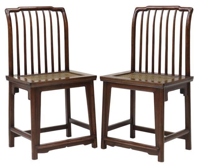 Appraisal: pair Chinese hardwood side chairs humpbacked top rail spindled back