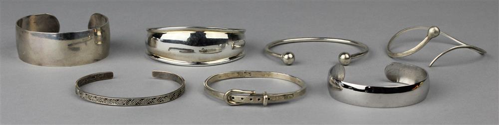 Appraisal: THREE STERLING CUFFS AND FOUR STERLING BANGLES all marked sterling