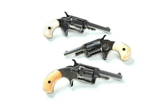 Appraisal: THREE ENGRAVED AND NICKEL PLATED REVOLVERS America late th century