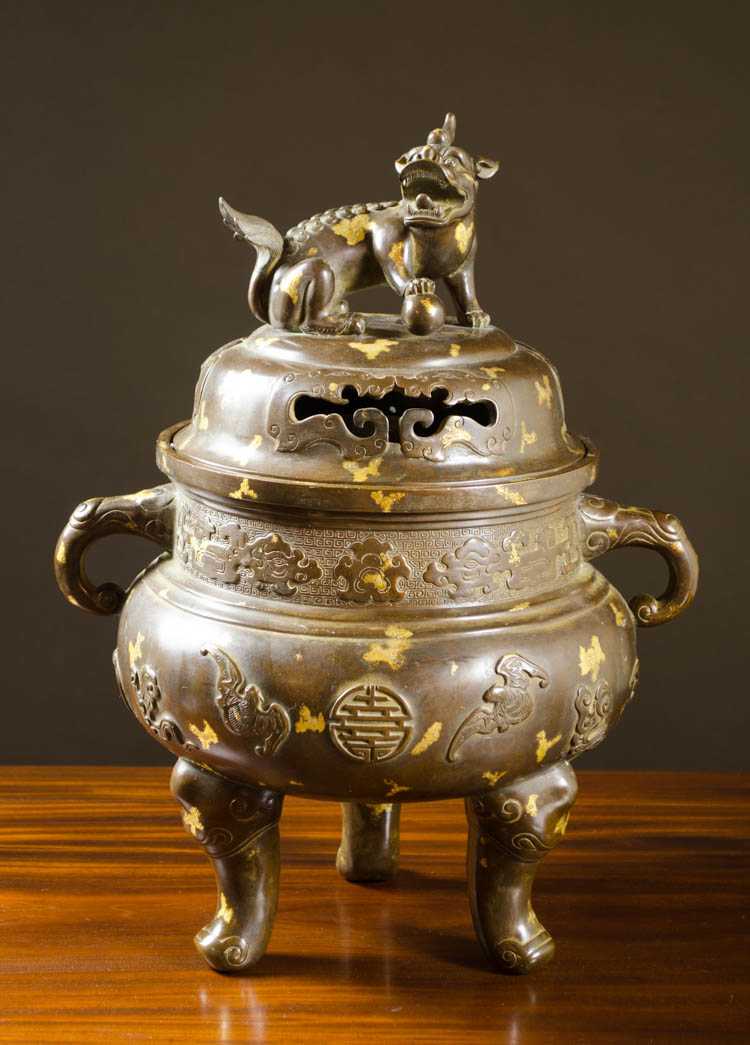 Appraisal: CHINESE QING SPLASH GOLD BRONZE LIDDED CENSER tri-footed patinated bronze