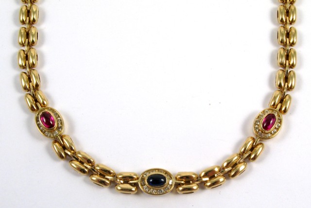 Appraisal: RUBY SAPPHIRE AND YELLOW GOLD NECKLACE k gold and set