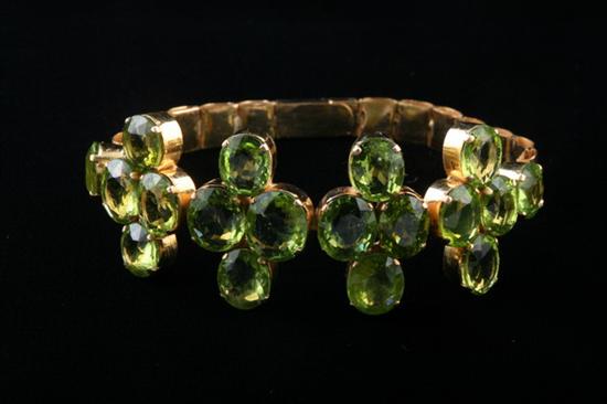 Appraisal: CUSTOM-MADE HIGH KARAT YELLOW GOLD AND PERIDOT FLEXIBLE LINK BRACELET