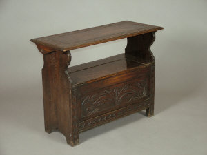 Appraisal: An oak monks bench mid th century the carved hinged