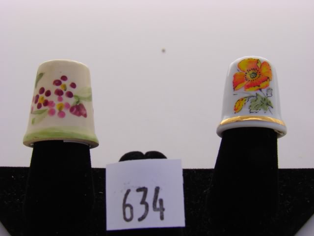 Appraisal: Lot of porcelain thimbles One with red floral designs and