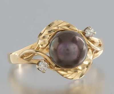 Appraisal: A Ladies' Black Pearl and Diamond Ring k yellow gold