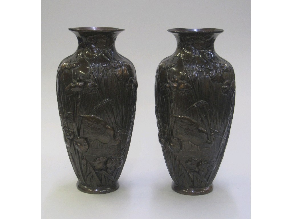 Appraisal: Pair of bronze metal vases decorated with irises