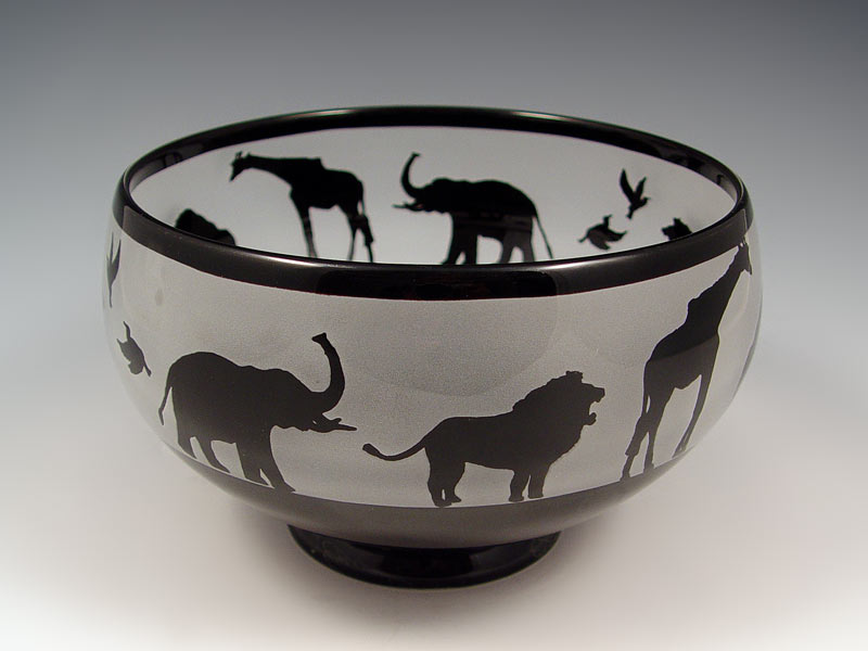 Appraisal: SIGNED ART GLASS BOWL IN AFRICAN ANIMAL MOTIF Limited edition