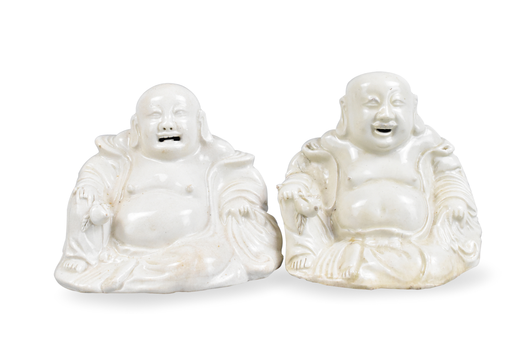 Appraisal: A pair of porcelain Chinese laughing buddha statues dating from