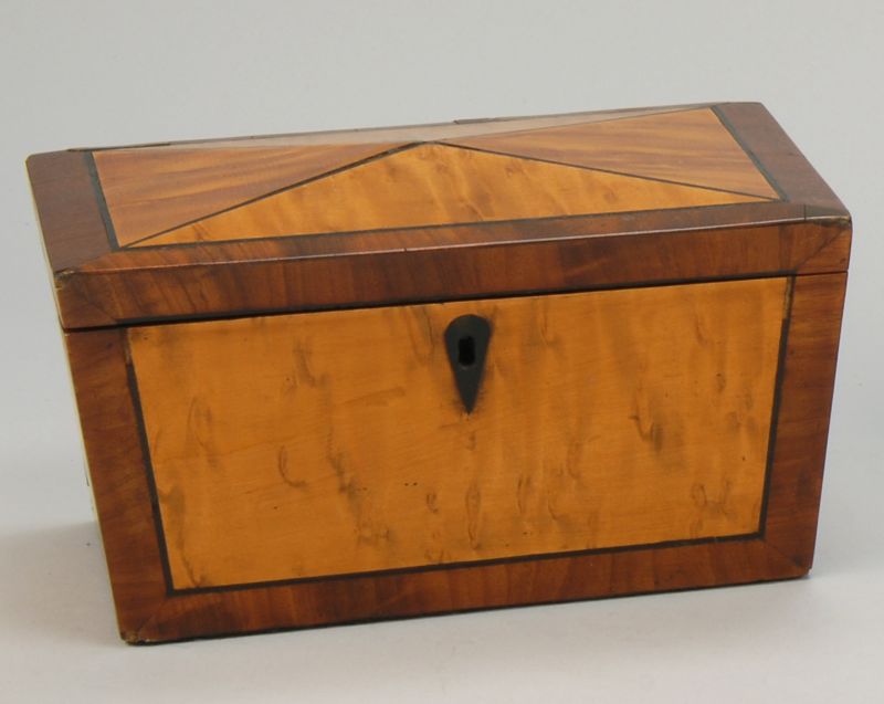 Appraisal: ANTIQUE WOODEN LIFT-TOP TEA CADDY th CenturyIn bird's-eye maple and