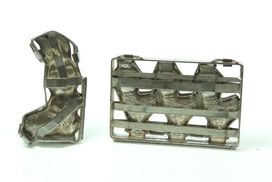 Appraisal: TWO CHOCOLATE MOLDS Second quarter- th century hinged cast metal