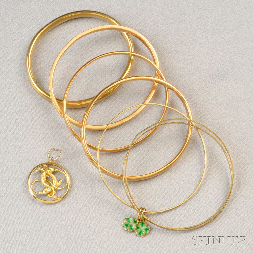 Appraisal: Seven kt Gold Bangle Bracelets one hinged together with three