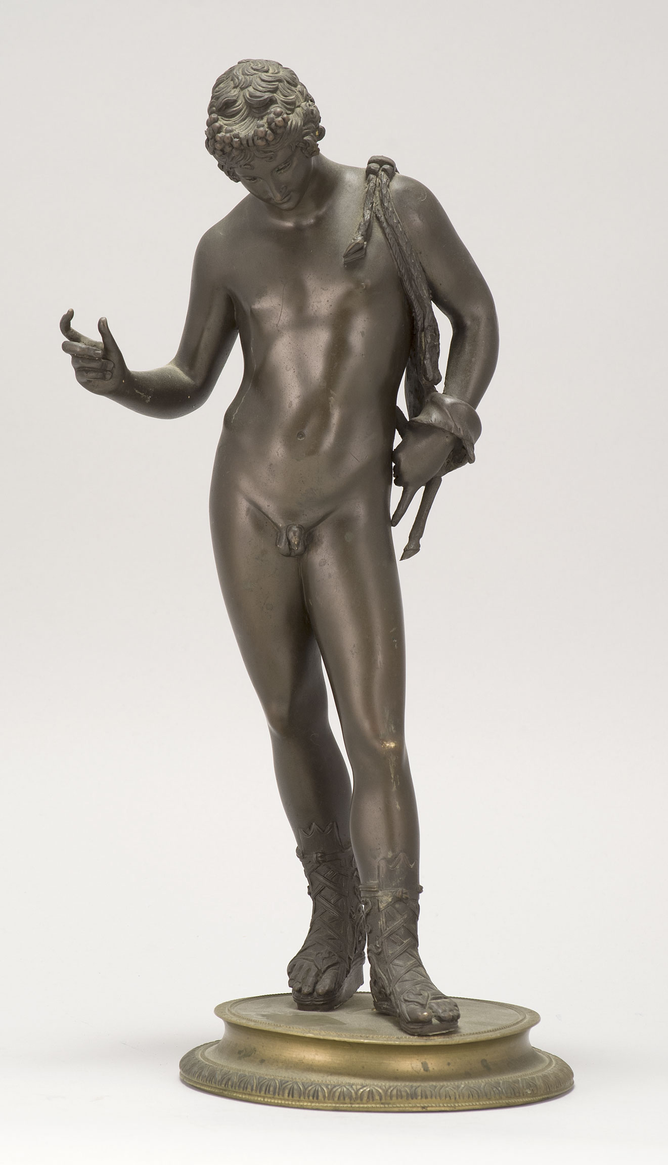 Appraisal: BRONZE FIGURE OF A CLASSICAL MALE NUDE on brass base