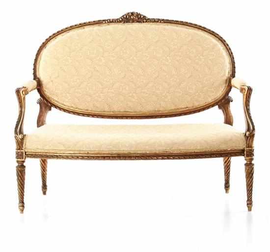 Appraisal: Louis XVI style carved giltwood settee th century settee with