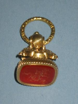 Appraisal: A GEORGIAN CORNELIAN SEAL the oblong stone with intaglio crest