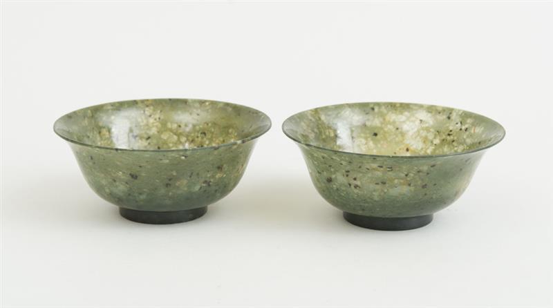 Appraisal: PAIR OF CHINESE SPINACH GREEN JADE BELL-FORM FOOTED BOWLS x