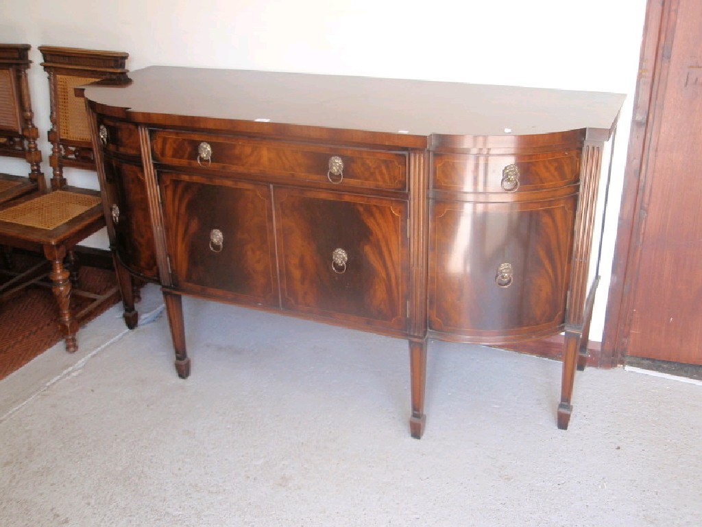 Appraisal: A reproduction Regency flamed mahogany sideboard by Rackstraw of Worcester