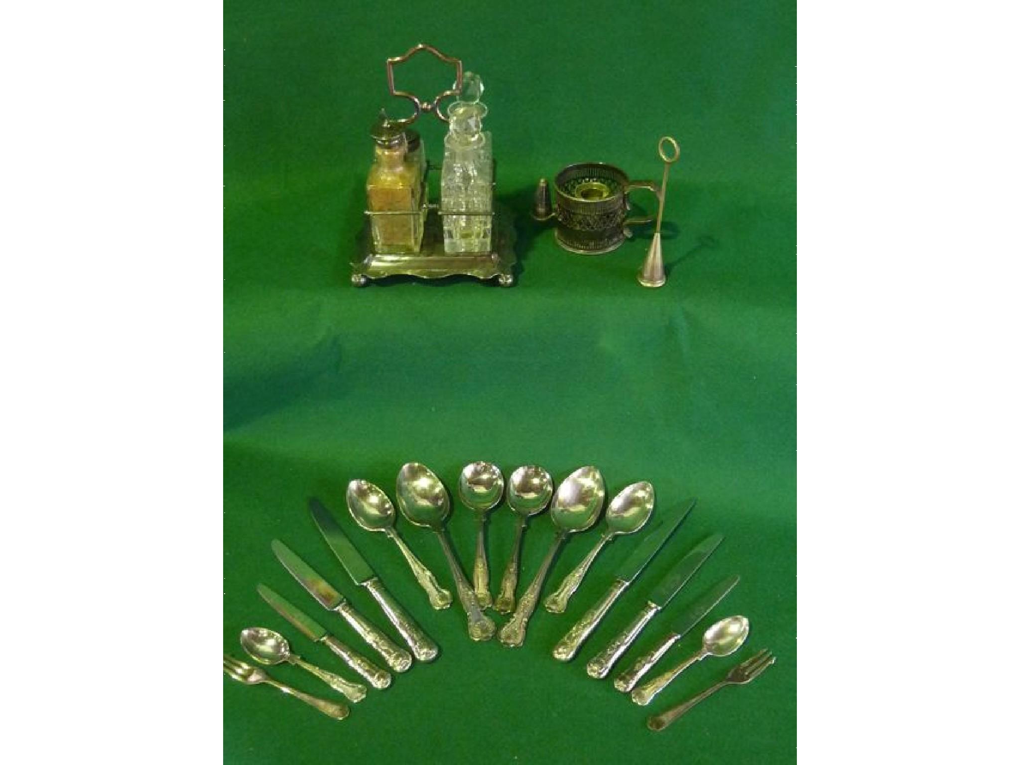 Appraisal: A four piece cruet set chimney chamberstick lacking glass and