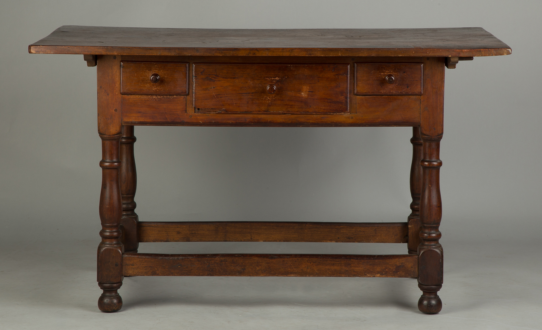 Appraisal: th Century Pennsylvania Walnut Table Stretcher base with turned legs